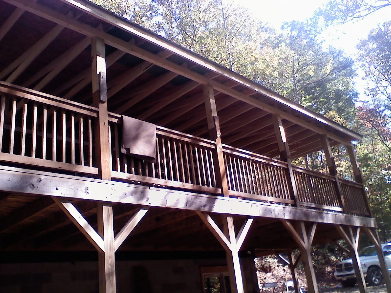Timber framing under a new elevated porch and deck — Roof Leak Repair in Rolesville by Roofing Brothers